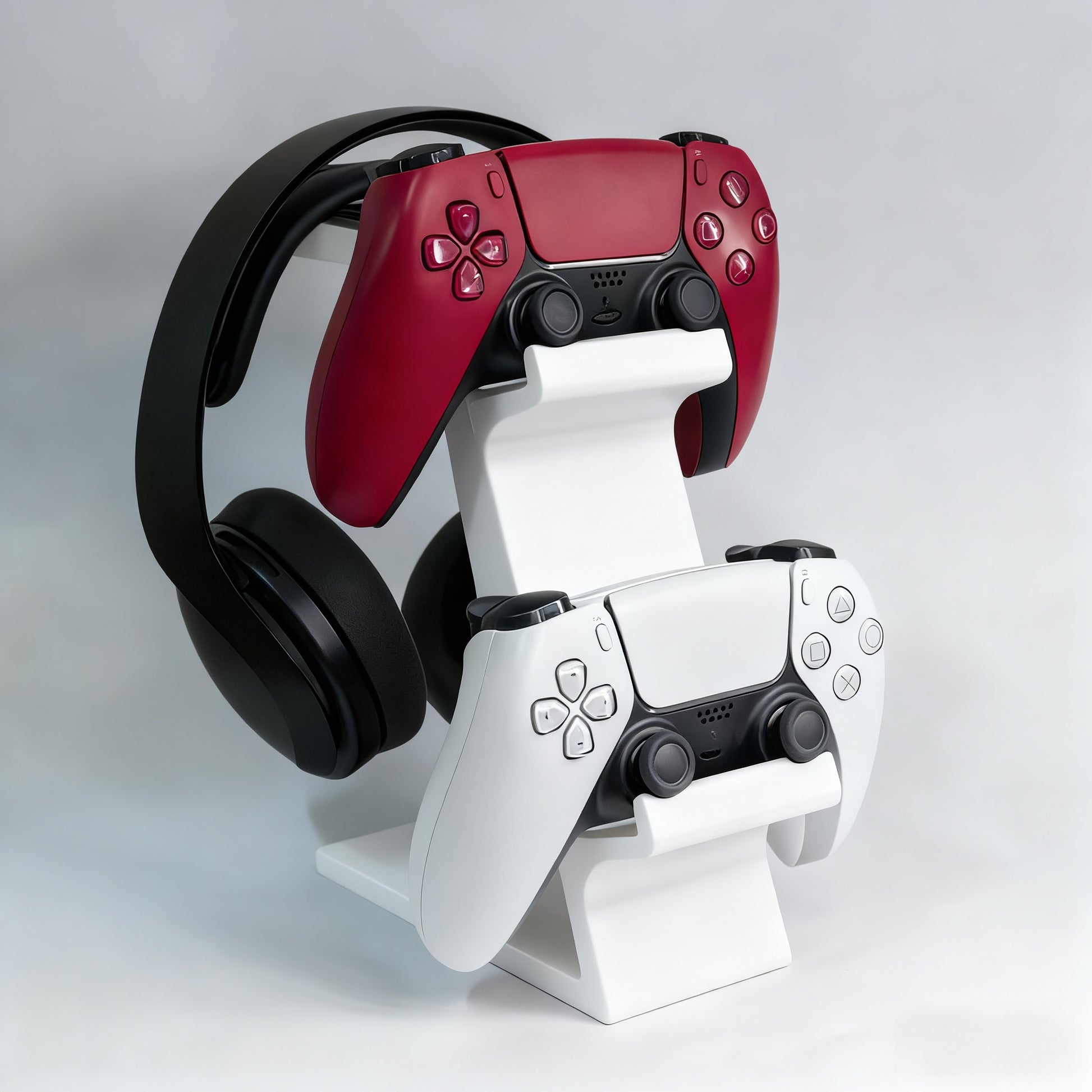 WHITE 3-in-1 PS5 and Xbox Controller Stand – Compatible with PlayStation 5/Xbox Consoles. A gaming desktop organizer with a headphone hanger, non-charging base that holds 2 controllers and headphones. Space-saving white/black console accessory.