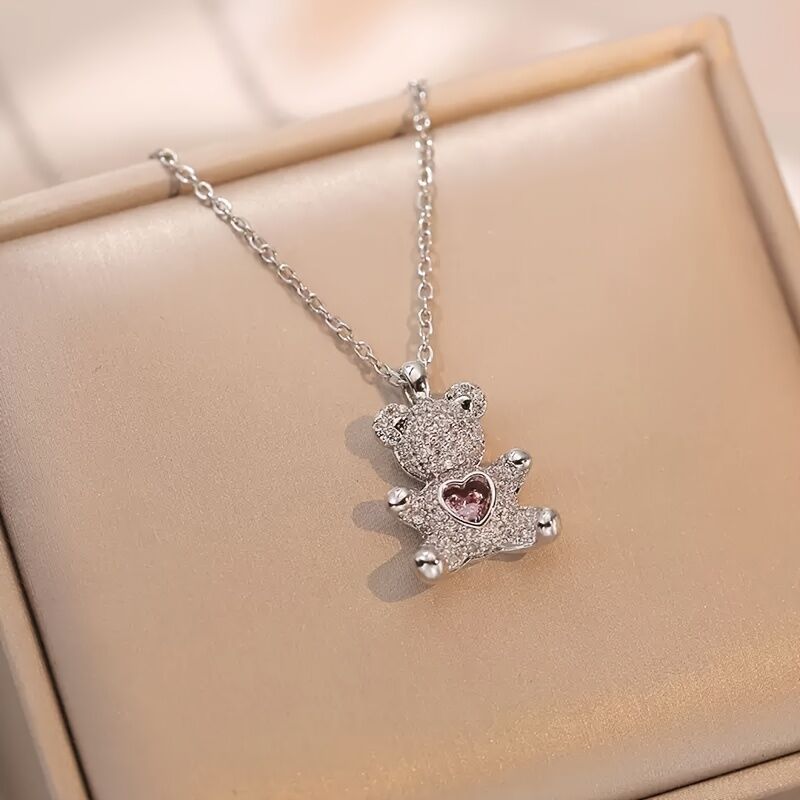 A delicate and adorable pink heart-shaped bear pendant copper necklace, adorned with synthetic zirconia, paired with a stainless steel chain, decorated with synthetic zirconia, perfect as a daily jewelry gift or a sweet and cute party accessory.（silver））