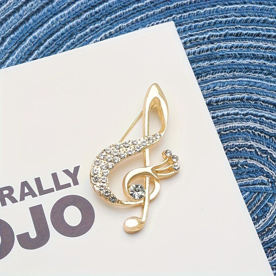 **Lively Musical Note Brooch: 5.8cm Gilded Movement, an Artistic Verse in Everyday Wear**
