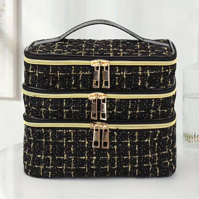 Fashionable and light luxury large-capacity black embroidered diamond-shaped cosmetic bag with three  for multi-level storage, portable and hand-held, suitable for home and travel use.