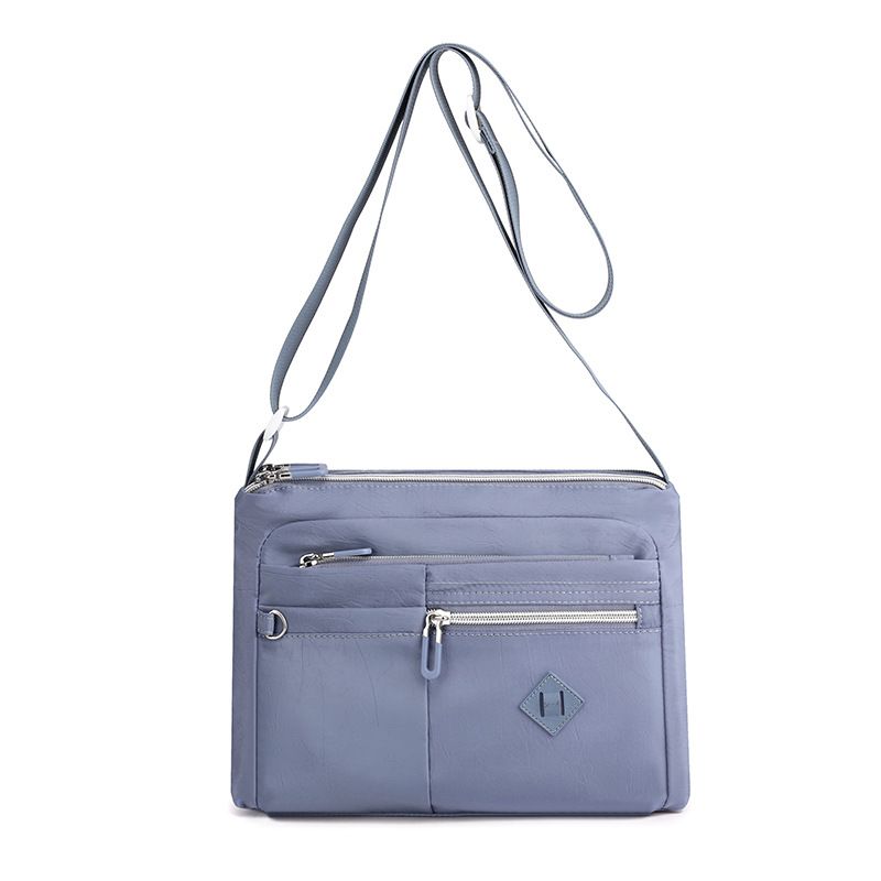 Lightweight Nylon Crossbody Shoulder Bag with Multi Pockets and Adjustable Strap, Light Blue