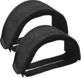 Black nylon bicycle pedal straps with adjustable straps.