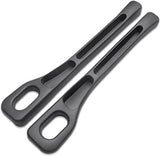 Black car seat gap filler strip installed in a car seat seam.