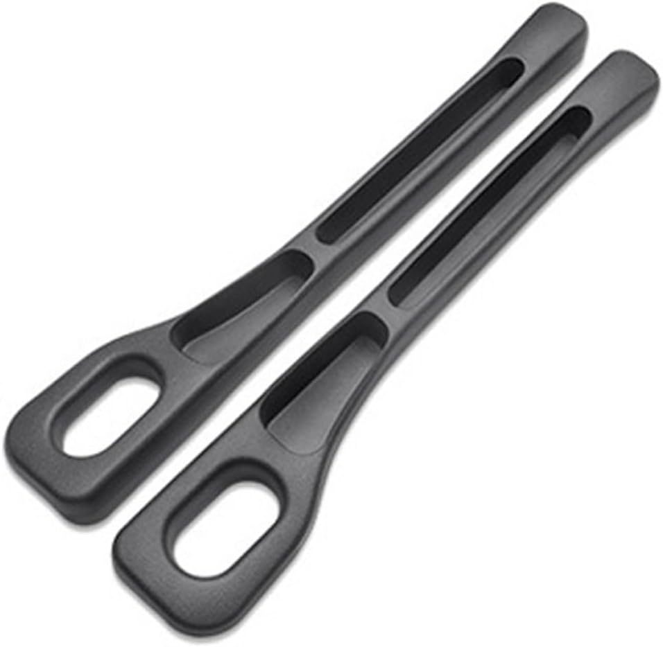 Black car seat gap filler strip installed in a car seat seam.