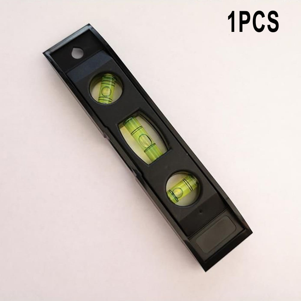 Mini torpedo level with three bubble vials and a magnetic base.