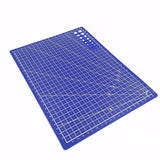 Blue A5 self-healing cutting mat with grid lines