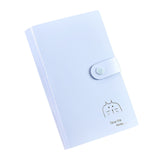 Business card holder with 120 card slots and a hard cover.
