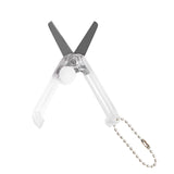 Mini folding scissors with keychain attached, stainless steel blades.