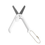 Mini folding scissors with keychain, stainless steel blades.