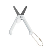 Mini folding scissors with keychain, stainless steel blades.