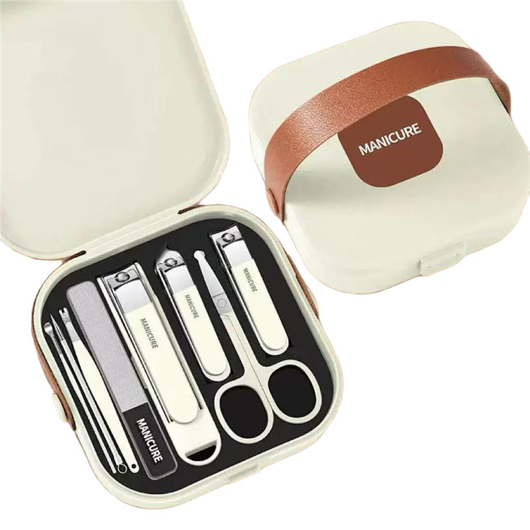 Manicure set - Pedicure set - Nail clippers - Nail scissors - Nail file - Tweezers - Stainless steel - Luxury case - Travel size - Nail cutting - Cuticle pusher - Nail styling - Hands and feet - Compact - Beige - 7 pieces