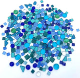 Blue mixed irregular crystal glass mosaic tiles with white backing.