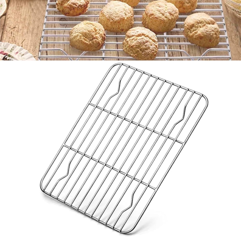 Stainless steel cooling rack with raised legs on a white background.