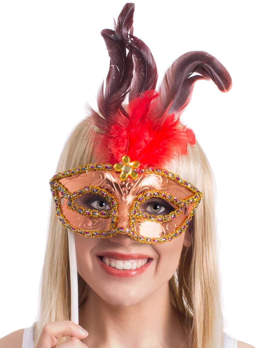 Handheld Red Feather Gold Masquerade Mask