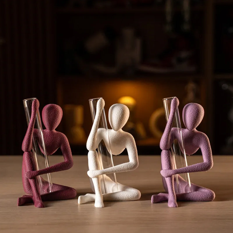 The "Blooming" vase stand adds a touch of nature to your space.