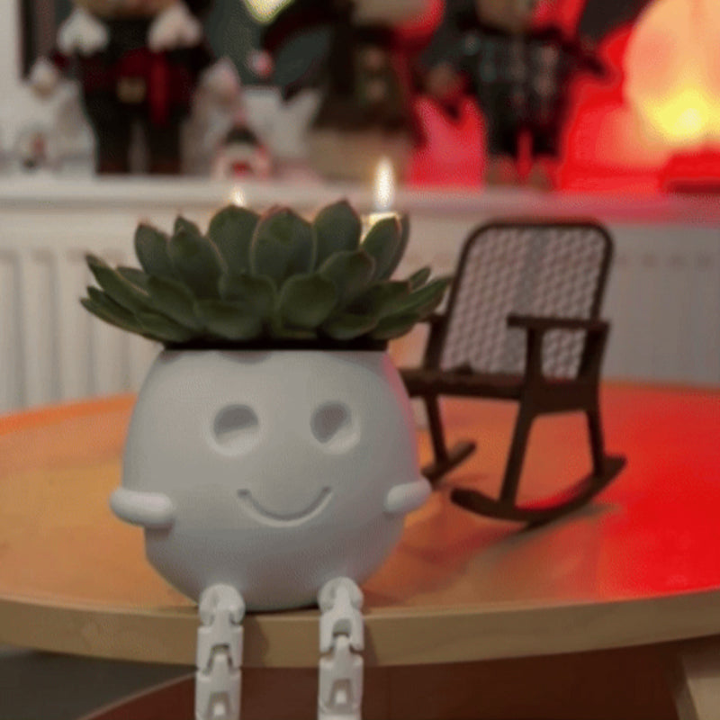 
3D printed rocking planter, perfect as a desktop decoration, bookshelf embellishment, or gift. White.