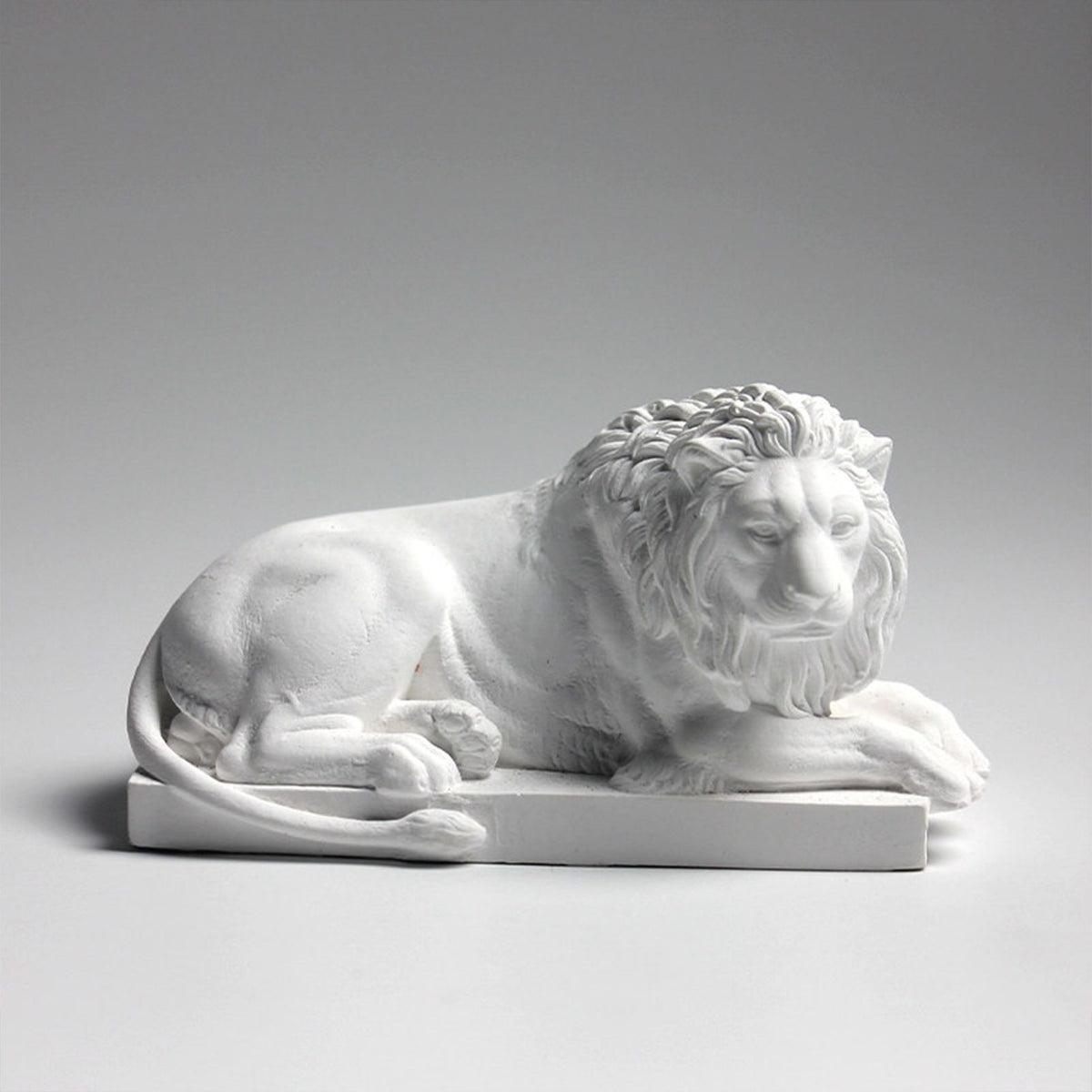 Classic Reclining Lion Sculpture Minimalist White Plaster Desk Ornament for Living Room, Study, or Office Decoration