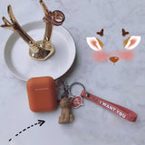 Brown jumpsuit + geometric reindeer Apple AirPods pro