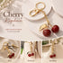 Mini bubble textured red cherry keychain with single gold leaf, dreamy soft sweetness follows you on every outing