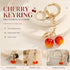 Mini refined pink cherry keychain with gold leaves, soft romantic touch elevates your daily matching style