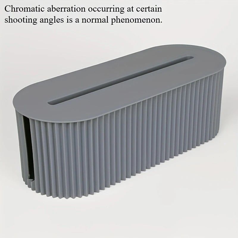 Milky blue cable storage box with lid, showing cable openings on the side.