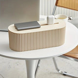 Beige cable storage box with lid open, showing internal space.