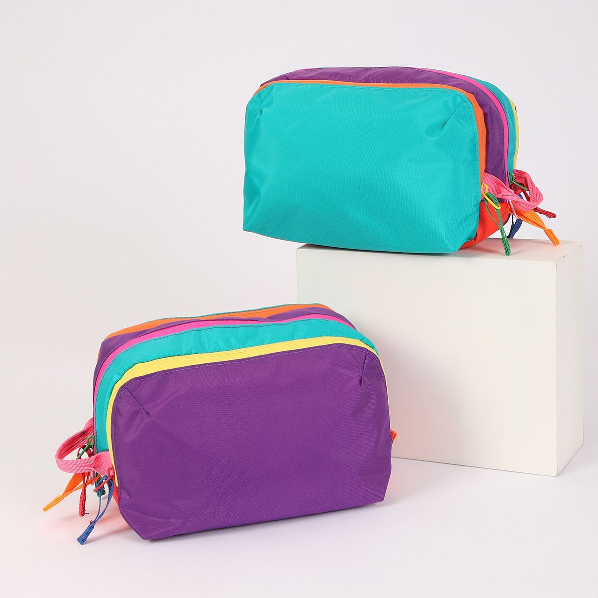 Dopamine Color-Blocking Cosmetic Bag, waterproof with large capacity, layered storage for skincare and makeup, easy opening and closing with drawstring zipper, essential sweet storage item for travel and commuting./Deep purple (front) (back) water green