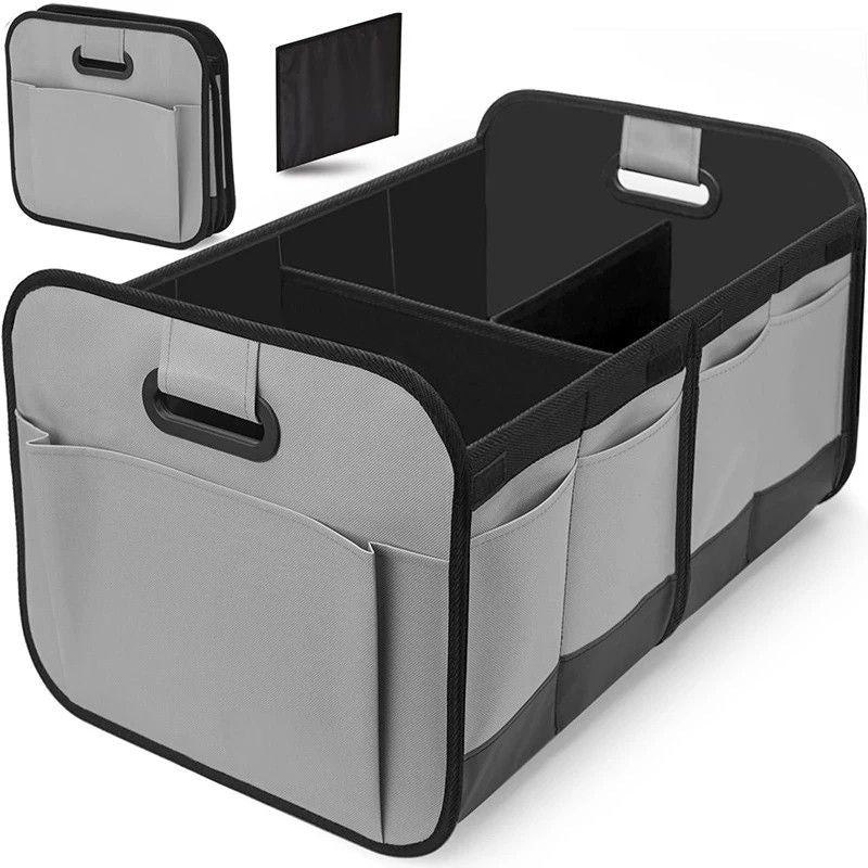 Grey foldable car trunk organizer with reinforced handles and multiple compartments.