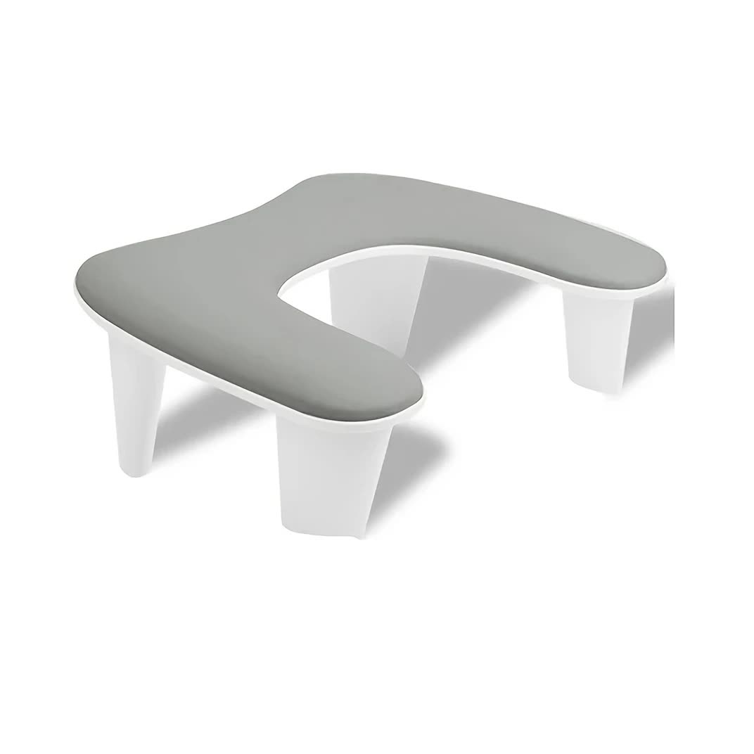 Grey This handheld nail care device integrates a U-shaped pillow and comes with a portable detachable stand. Designed with an inclined PU material and a sturdy base, it is crafted for both comfort and portability.