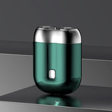 Green Men's Mini Electric Shaver, with USB-C Fast Charging, detachable dual-head system, portable design ideal for travel and business trips.