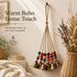 Handmade Bohemian Wind Chime, featuring jute rope with brass bells and colorful wooden beads, rings melodiously in the gentle breeze, adding natural romance to your home.