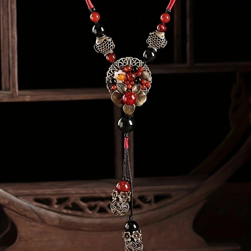 Bohemian style long necklace featuring retro beads and metal carved flowers with elegant dangling tassels adjustable 86cm chain suitable for pairing with sweaters and dresses perfect for daily wear or holiday occasions