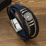 2PCS Handwoven Tree of Life Magnetic Clasp Bracelet, featuring a blue synthetic leather double-layer design. Blending vintage charm with contemporary style, it symbolizes flourishing life and is perfect for both personal wear and thoughtful gifting.