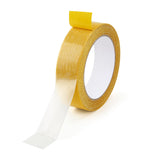 Roll of double sided fabric tape, 3cm wide.