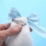 Blue plush bunny ears with a ribbon bow-knot hair clip.