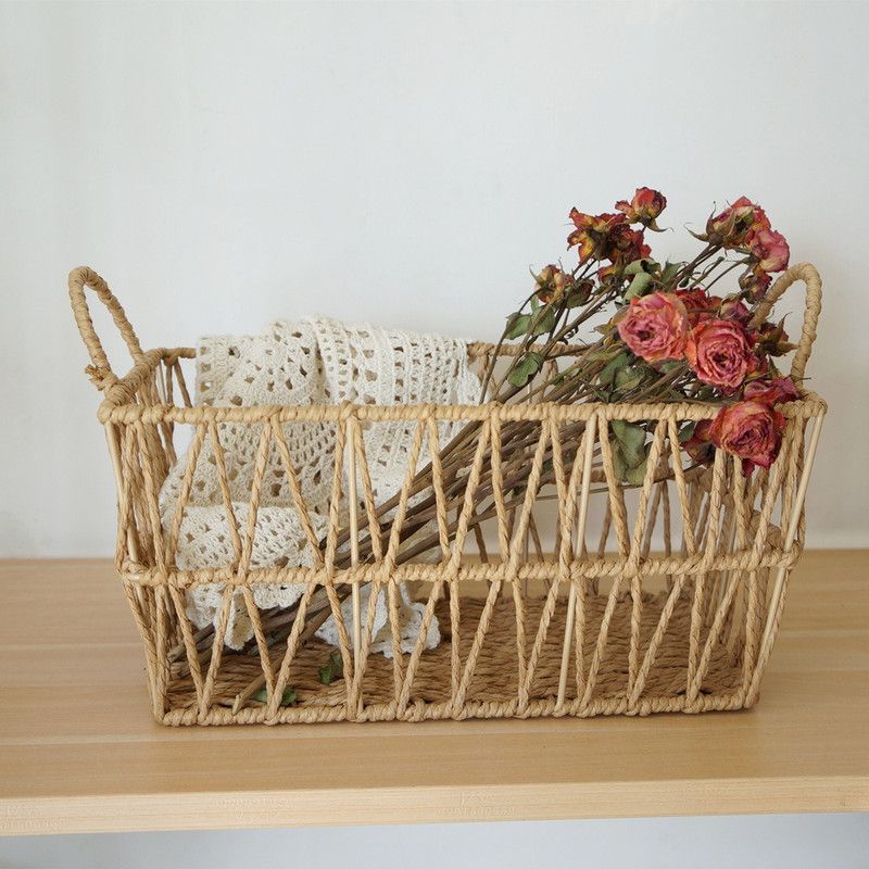 Handwoven paper rope storage basket with a rectangular design and two handles; perfect for organizing desk clutter, snacks, and cosmetics; Bohemian-style storage basket