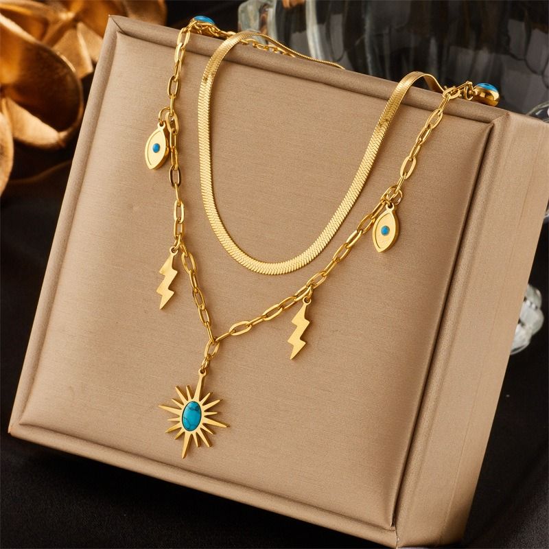 Double-layered bohemian-style necklace, 18K gold-plated titanium choker with eye and lightning bolt pendants