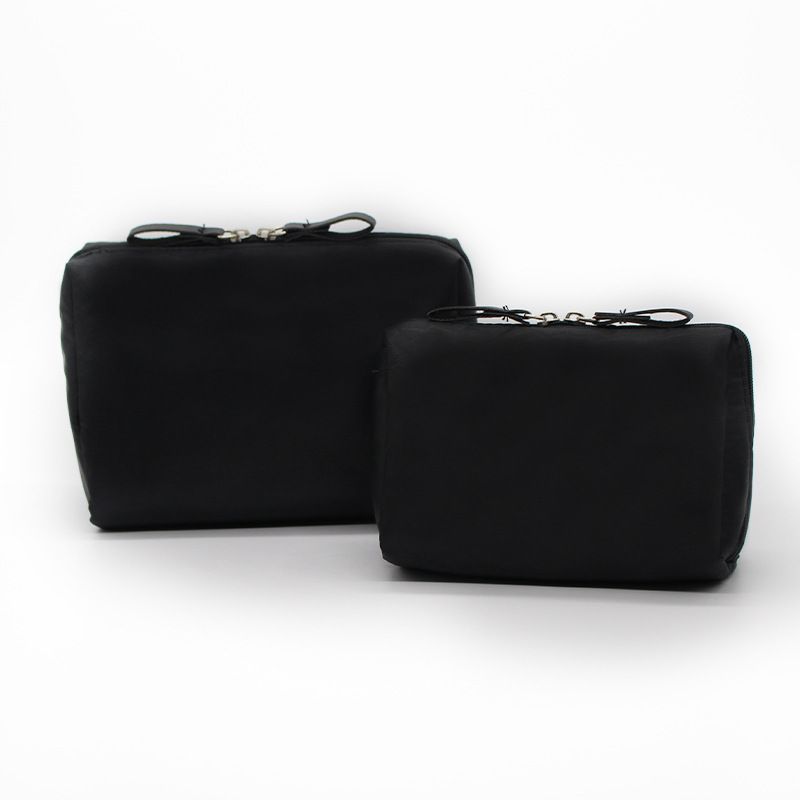 Ai Cheng Space Makeup Bag Travel Storage Hand-held cosmetic bag [black outside and red inside] small size