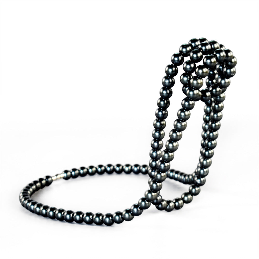 Black Modern Floating Pearl Wine Bottle Holder - Elegant Home Decor, Unique Kitchen Accessory for Dining, Bar, and Livin