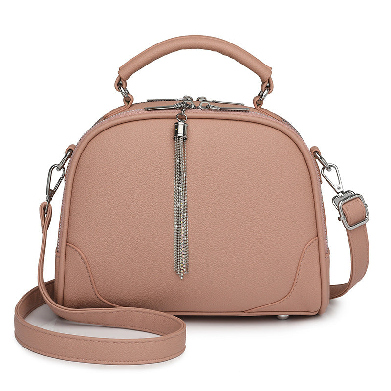 Pink Chic Mini Round Crossbody Bag for Women - Elegant Handbag with Tassel Accent