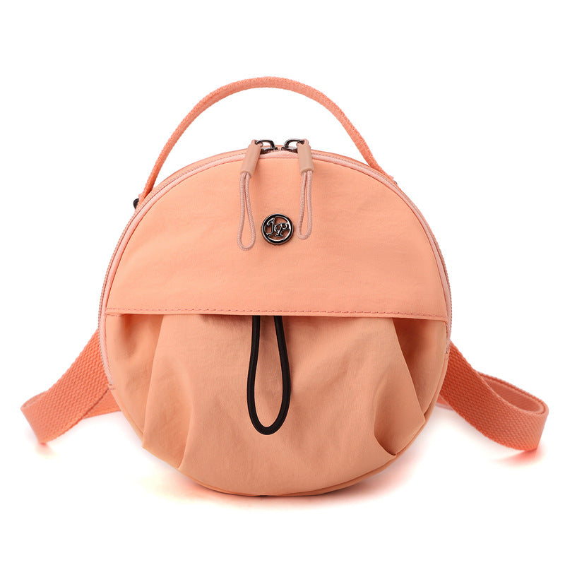 Orange Fashionable Round Crossbody Bag with Water-Resistant Nylon and Multi-Pocket Design for Daily Travel Lightweight Hands-Free Storage Solution for Local Professionals