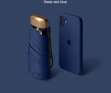 Compact Mini Pocket Umbrella UPF50+ Sun Protection Lightweight Travel Parasol - Windproof 5-Fold Rain Shade with Flat Gold Handle (Deep Sea Blue)