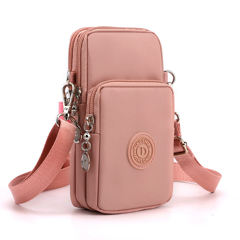 Pink 3-Layer Waterproof Nylon Vertical Crossbody Phone Bag -  Lightweight Phone Purse with Headphone Jack & Adjustable Strap