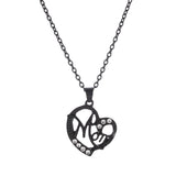 Heart pendant necklace with "MOM" lettering and rhinestones.
