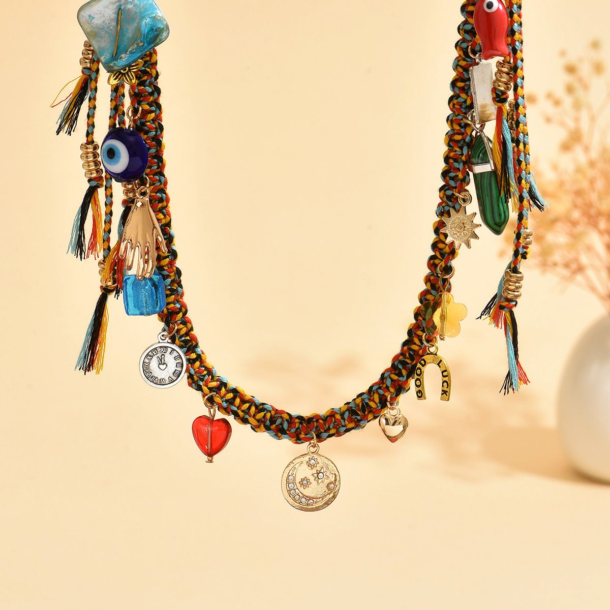Ceramic fish, glass beads, and metal charms on a keychain.