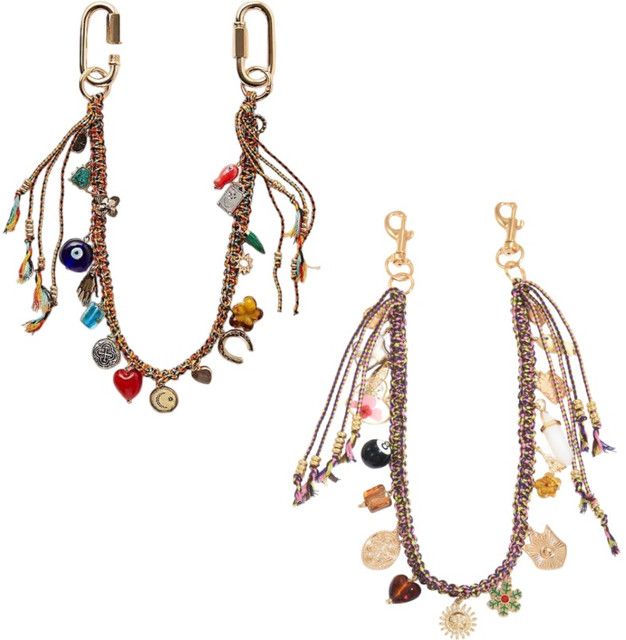 Ceramic fish and medallion charms with layered beads and horseshoe.