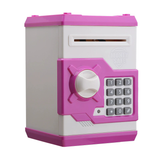 White and Pink Children's Electronic Password Piggy Bank — An ATM-style automatic money-rolling safe featuring a digital keypad lock, 4-digit password security, and a coin slot. Powered by three AA batteries (not included), this educational and developmen